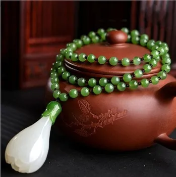 

Chinese Handcarved 100% Natural Nephrite White Jade Magnolia Flower Pendant Necklace