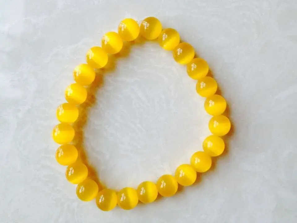 

The new 8 mm yellow cat's eye beads stretch bracelet bracelet 7 " 0303 28%