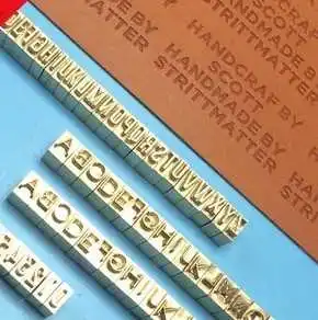 

Copper brass alphabets molds 52pcs Upper case + Lower case + 10 numbers + 5 symbols + clamp holder , 67pcs total. hot foil stamp