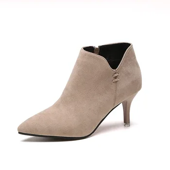 

Autumn and winter new European and American sexy rivets high-heeled boots fashion legs pointed velvet female Martin boots.