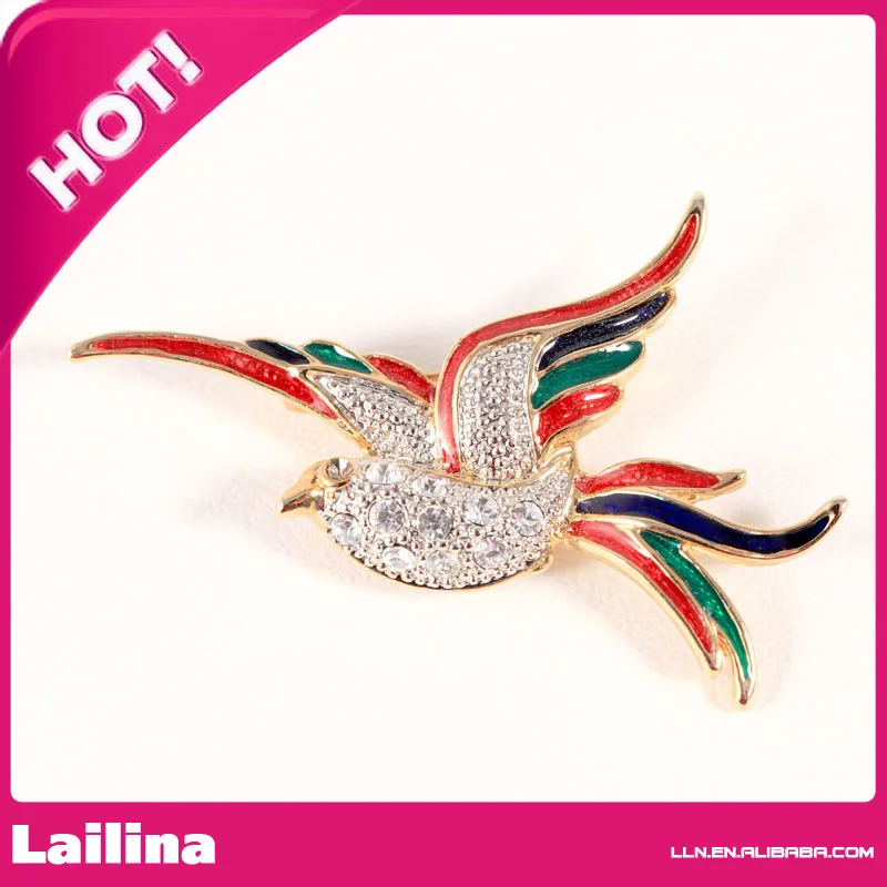

Vintage Enamel and Rhinestone Gold Tone Bird in Flight Swallow Pin Brooch
