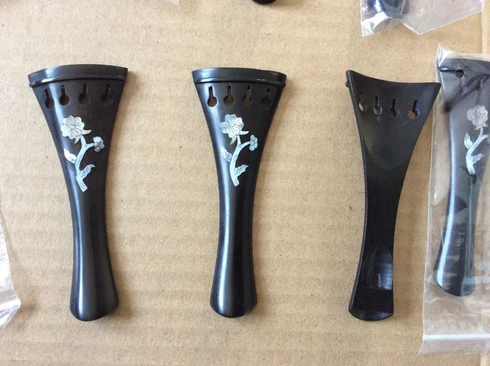 

Ebony violin tailpiece ,One pieces of 4/4 size violin ebony tailpiece ,shell flower inlay , violin parts
