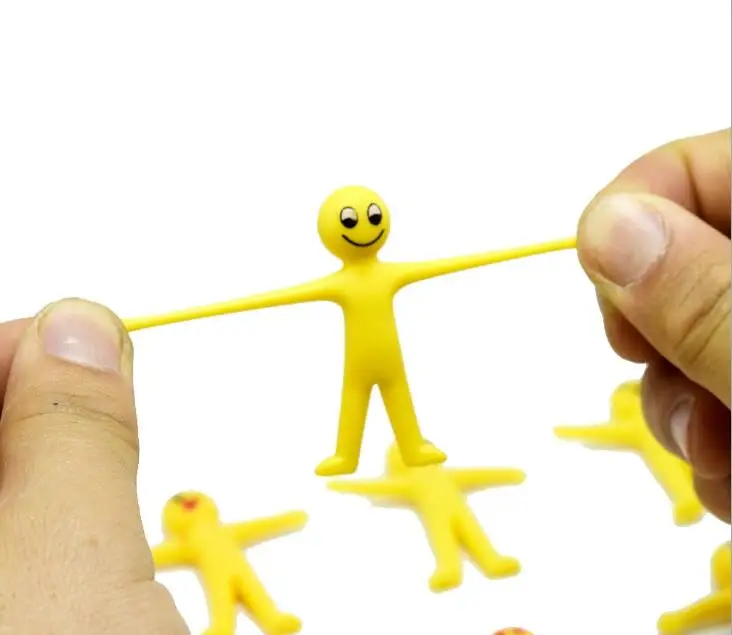 

2pcs/lot TPR Soft Plastic Creative Expression Small Yellow Man Can Pull The Little Doll Capsule Toys
