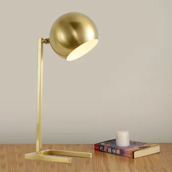 

Modern metal gold table lamp personality round head designer model room living room bedroom decorative table lamp