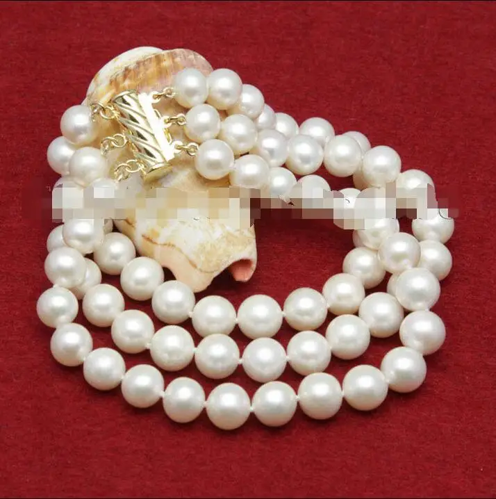 

Hot selling free shipping******** lovely 3 rows AAA 9-10mm white fresh water pearls bracelets 8
