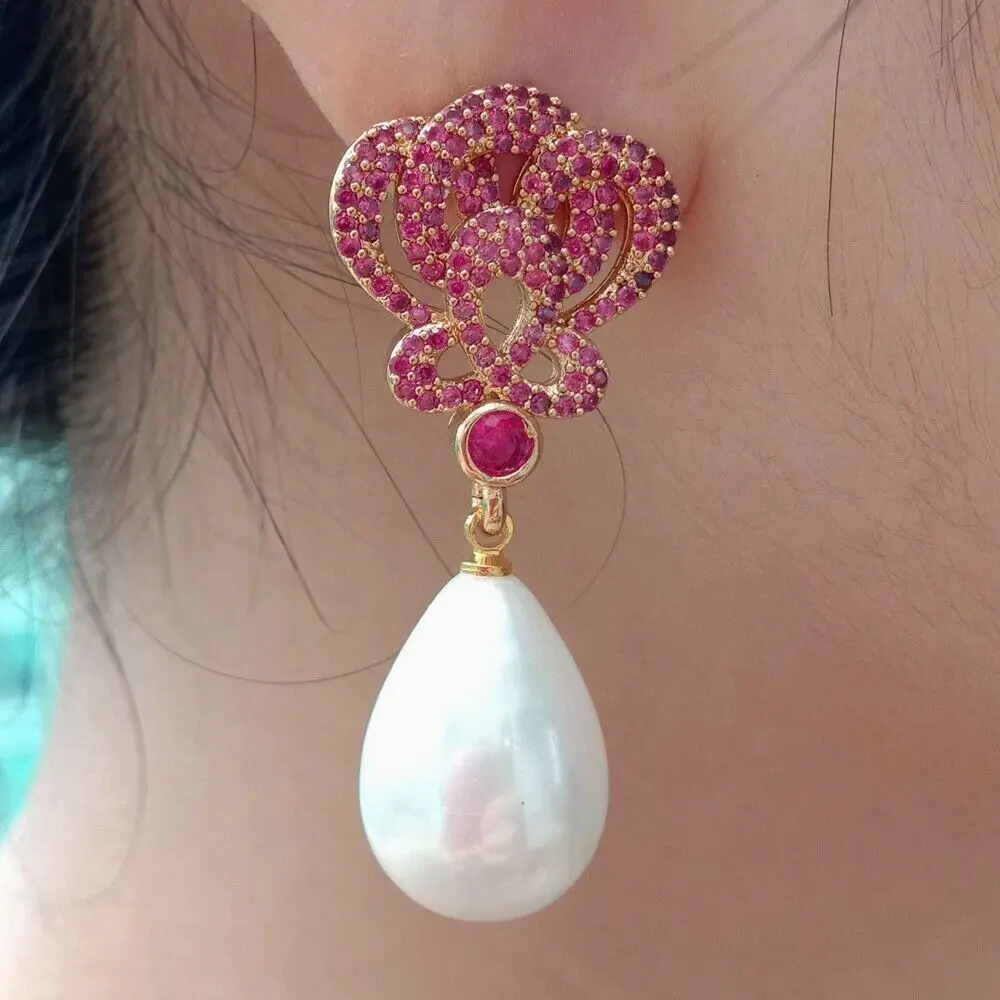 

Teardrop White Sea Shell Pearl Golden Plated Fuchsia Cz Drop Earrings