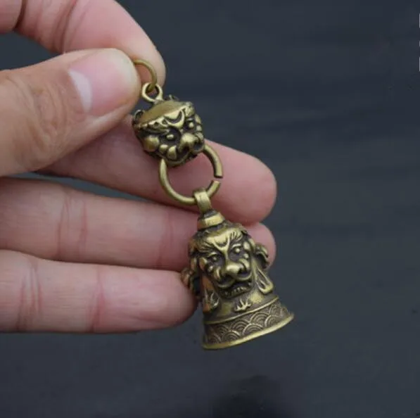 

China Pure brass Carving Lion head Small bell Pendant
