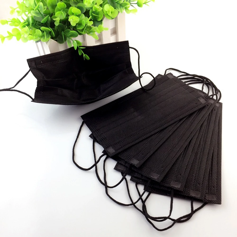 

50pcs/lot Disposabl four Layers PM2.5 Black Mouth Mask Anti Haze Breathable activated carbon Anti dust Mouth-muffle Face masks