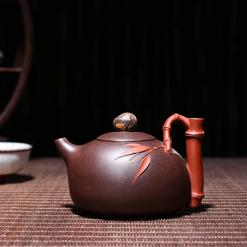 

Quality Goods Famous Manual Raw Ore Two Colors Of Purple Clay Bamboo Joint Xi Shi Kettle Kungfu Online Teapot Tea Set Suit