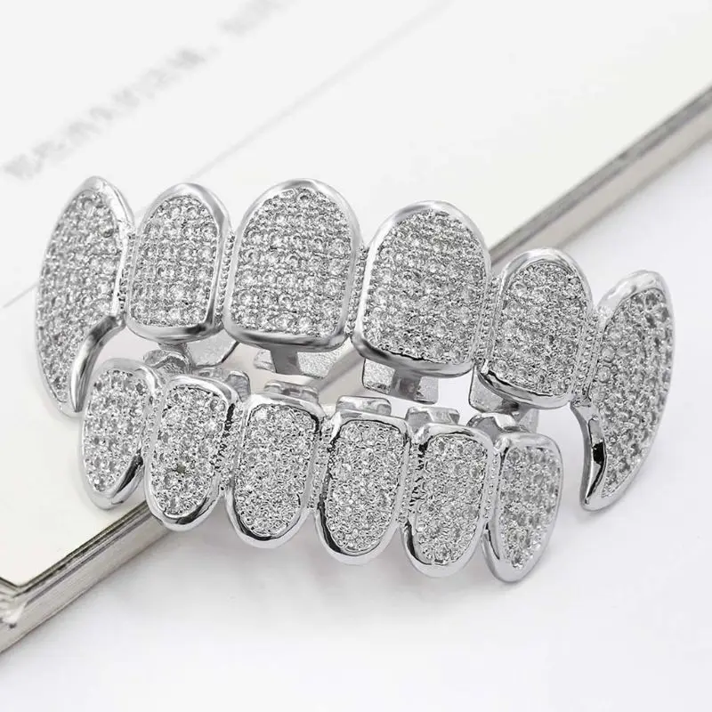 

Gold Silver Luxury Rhinestone Vampire Grillz Set with Extra Silicone Bars Included Top size 5.3cmx1.8cm Bottom size 4.1cmx1.1cm
