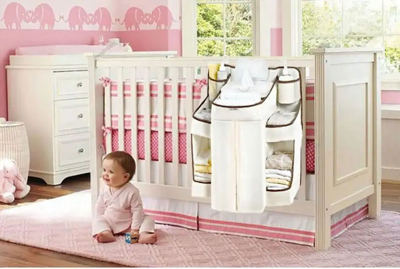 New Storage Bag Organizer Hanging Up Baby Diaper Nappy Pockets