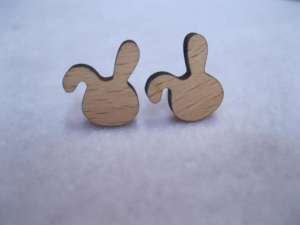 unique design laser cut rabbit with a bow bead ear earringsin Stud