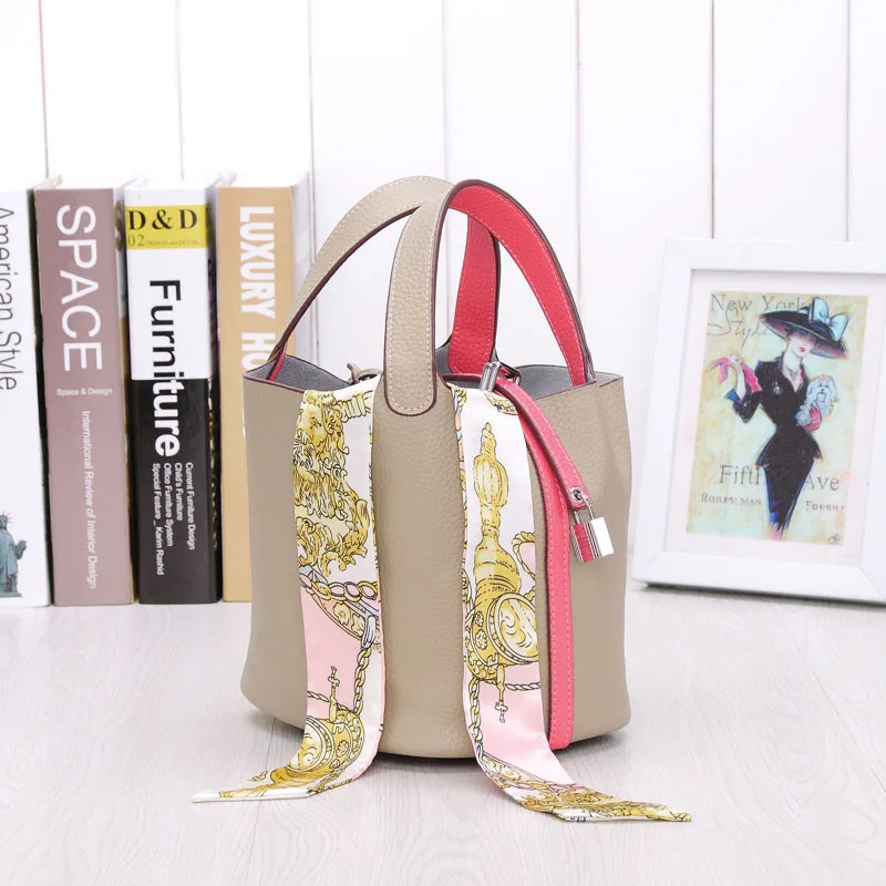 

2019 Lunch-box Package Lock Cowhide Togo Bucket Genuine Leather Portable Woman Package Basket Small Square Package