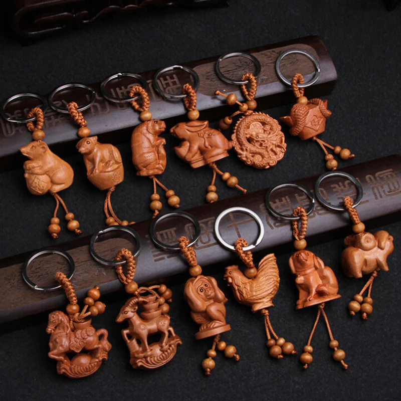 

animal monkey sheep snake dragon tiger key chains key ring Fashion Natural wood 12 zodiac keychain for unisex children