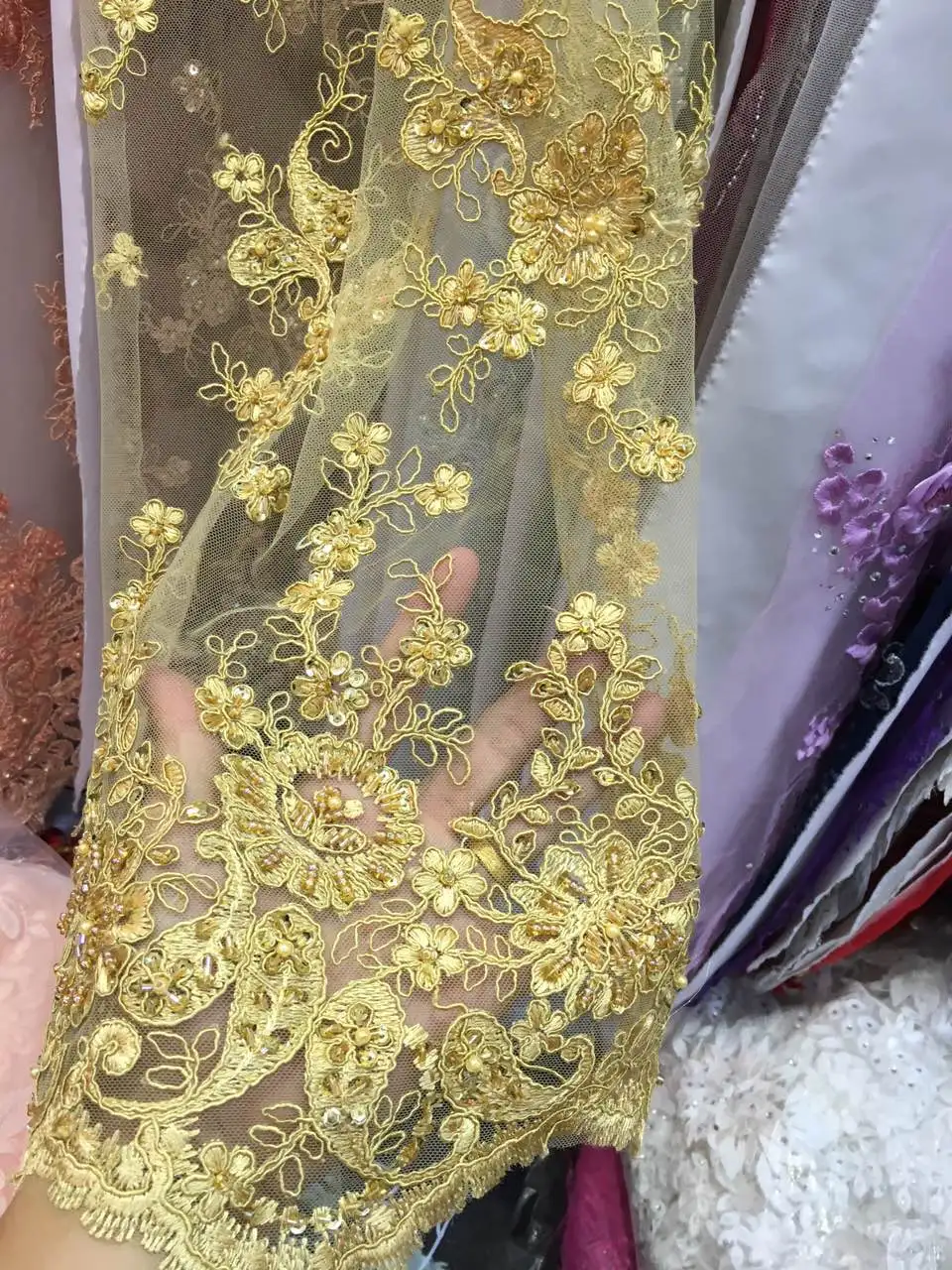 

Black+gold colours.African net lace with sequins Top quality French lace fabric Fashionable net lace for party dress