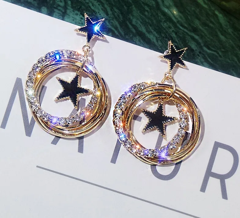 

S925 silver needle moving star earrings multi-layer flash crystal from Swarovski circle earrings temperament Mother's Day gift