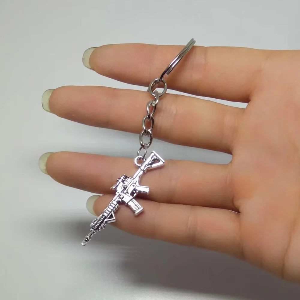 Fashion Miniature Revolver Pistol Weapon fashion Model Keychain Key Rings New Mini Gun key Chain For Men Jewelry Surprise Gift Fashion Miniature Revolver Pistol Weapon fashion Model Keychain Key Rings New Mini Gun key Chain For Men Jewelry Surprise Gift