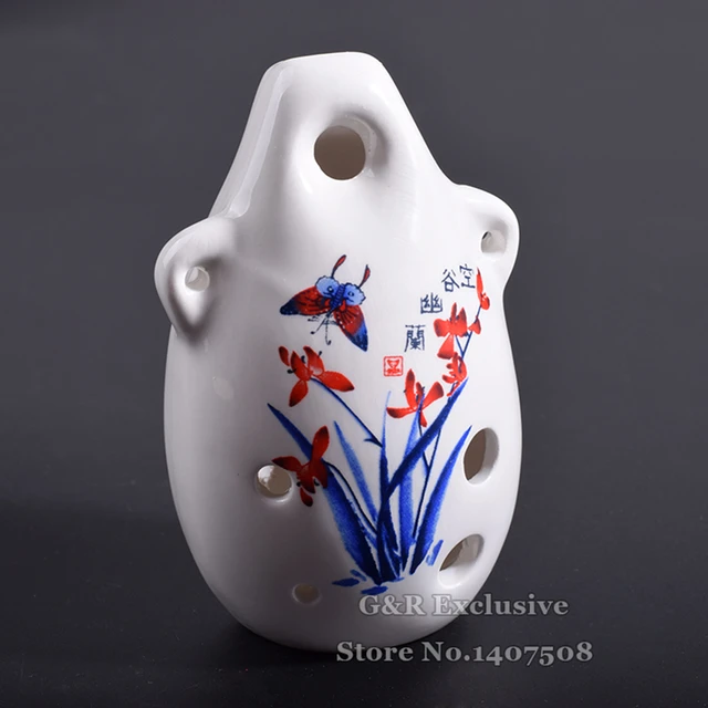 Ancient flute like instrument ceramic with holes deals