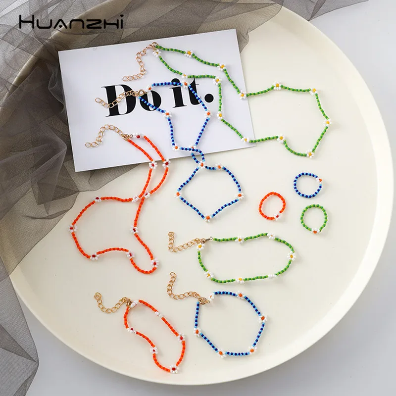 

HUANZHI Trendy Colorful Small Flower Beading Acrylic Summer Sweet Cute Short Chain Necklace for Women Girls Party Travel Jewelry