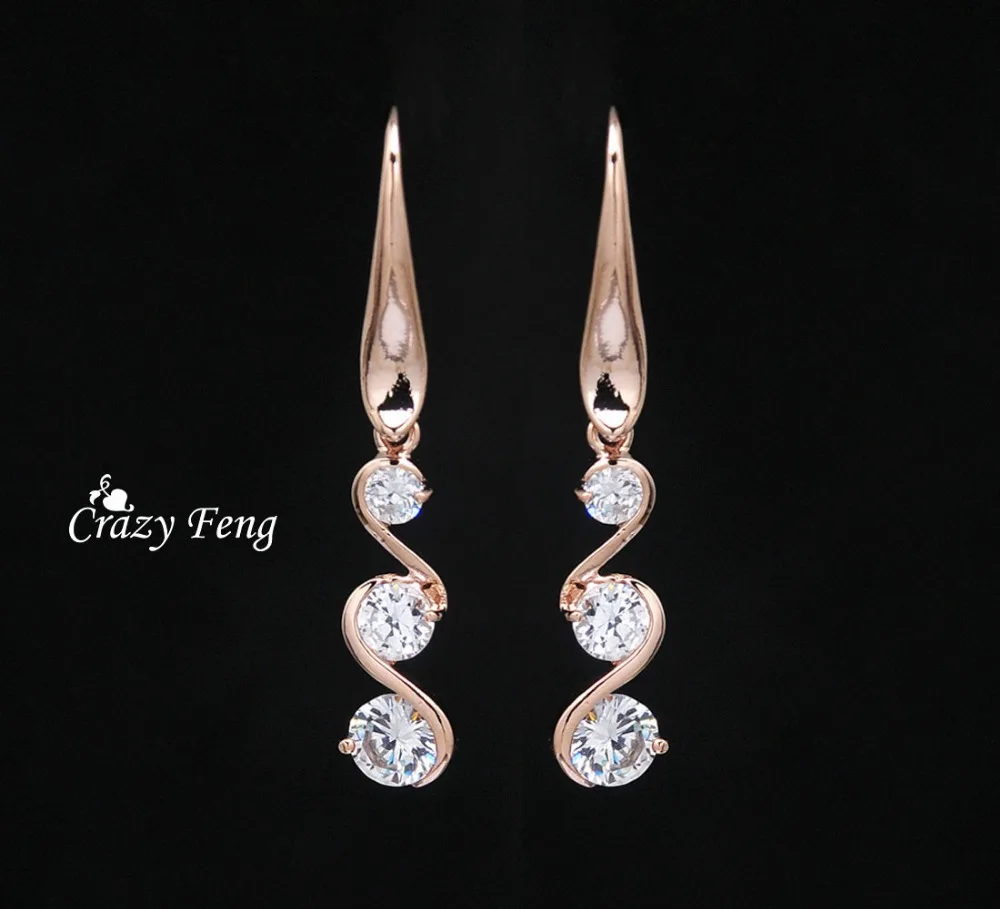 

Crystal Charms Rose Gold Color CZ Crystal Earring Zircon Pierced Snake Dangle Drop Earrings High Quality Free Shipping