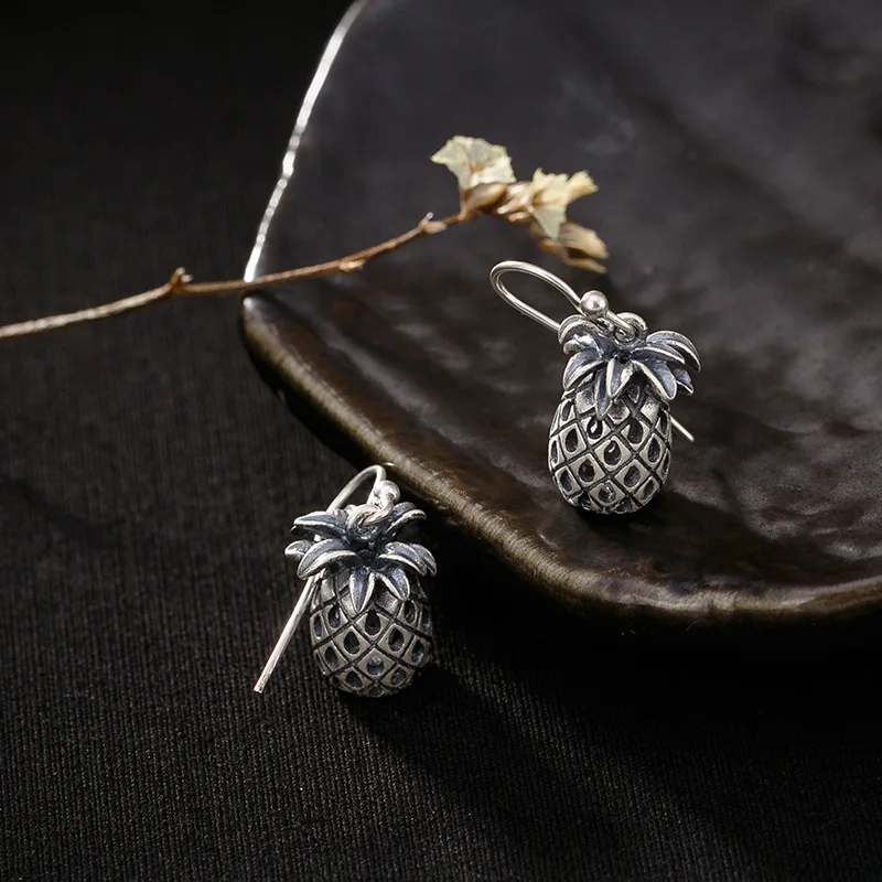 

pure silver restoring ancient ways do old matte hollowed-out pineapple personality joker ms stud earrings tremella hook