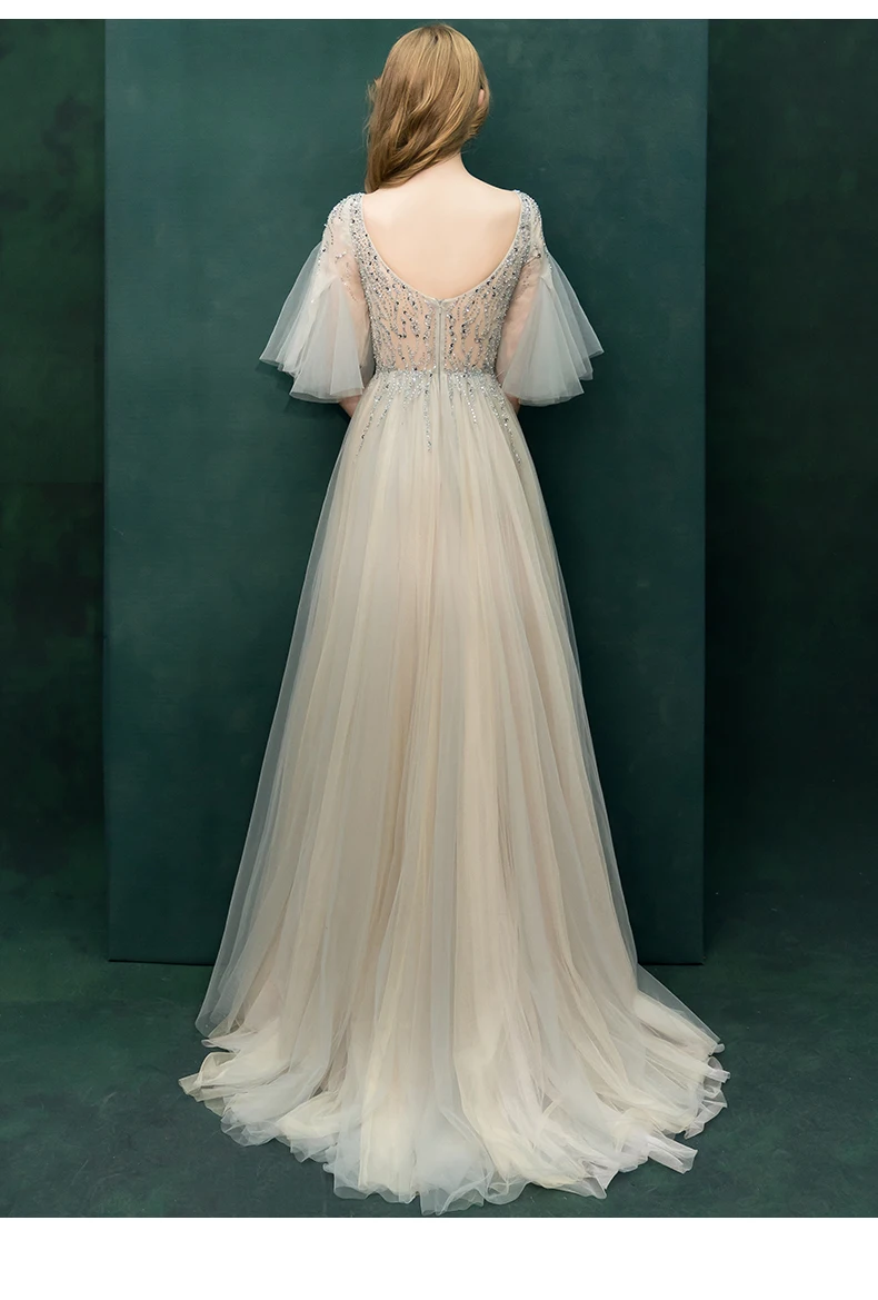 Сексуальное вечернее платье расшитое блестками длинное сексуальное с v образным