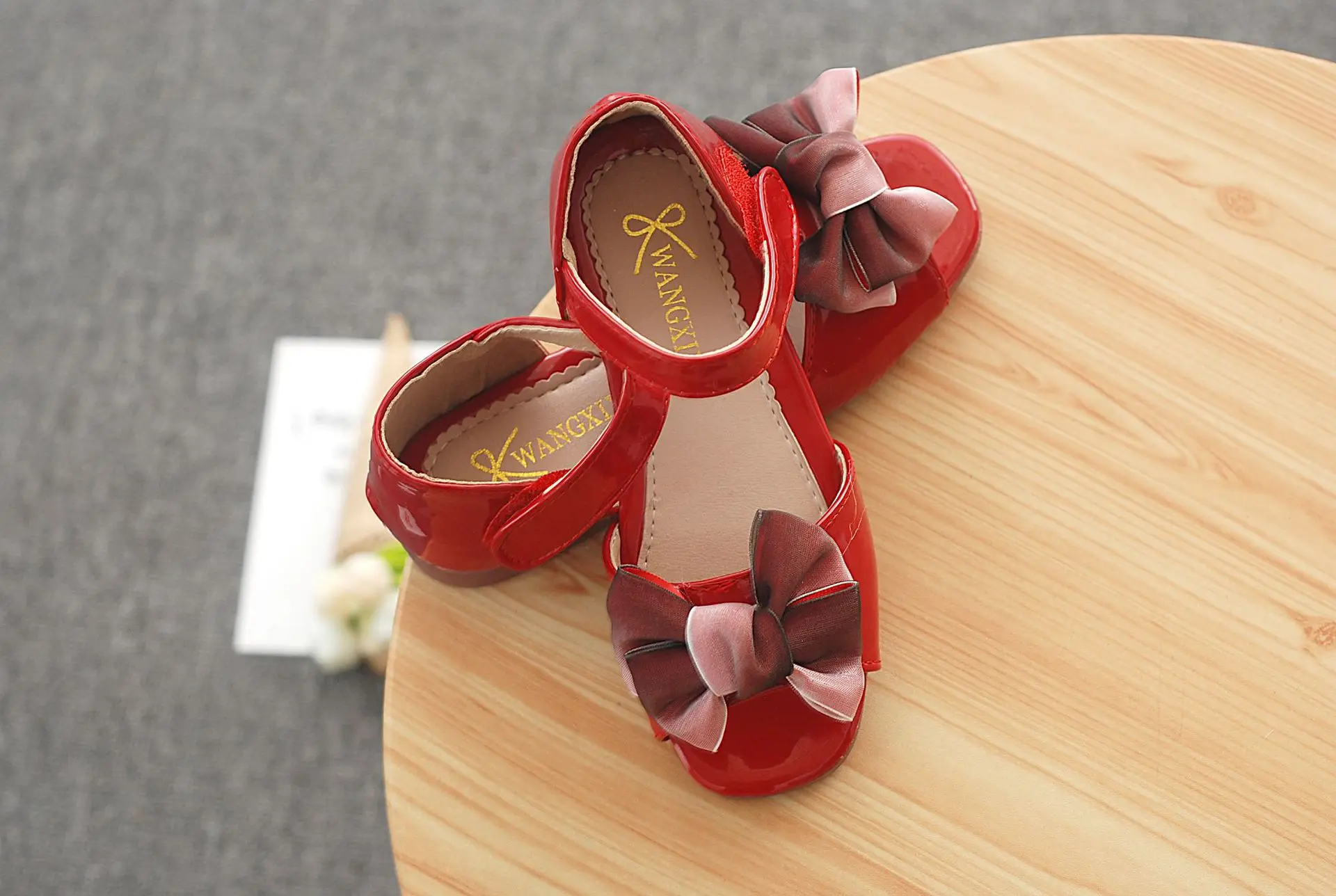 Summer new female baby shoes fashion open toe children's sandals Korean version of the color matching bow bag with girls shoes