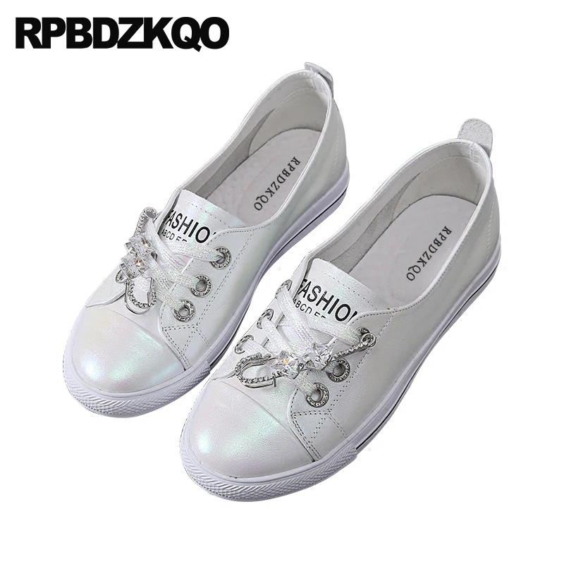 black flat trainers womens