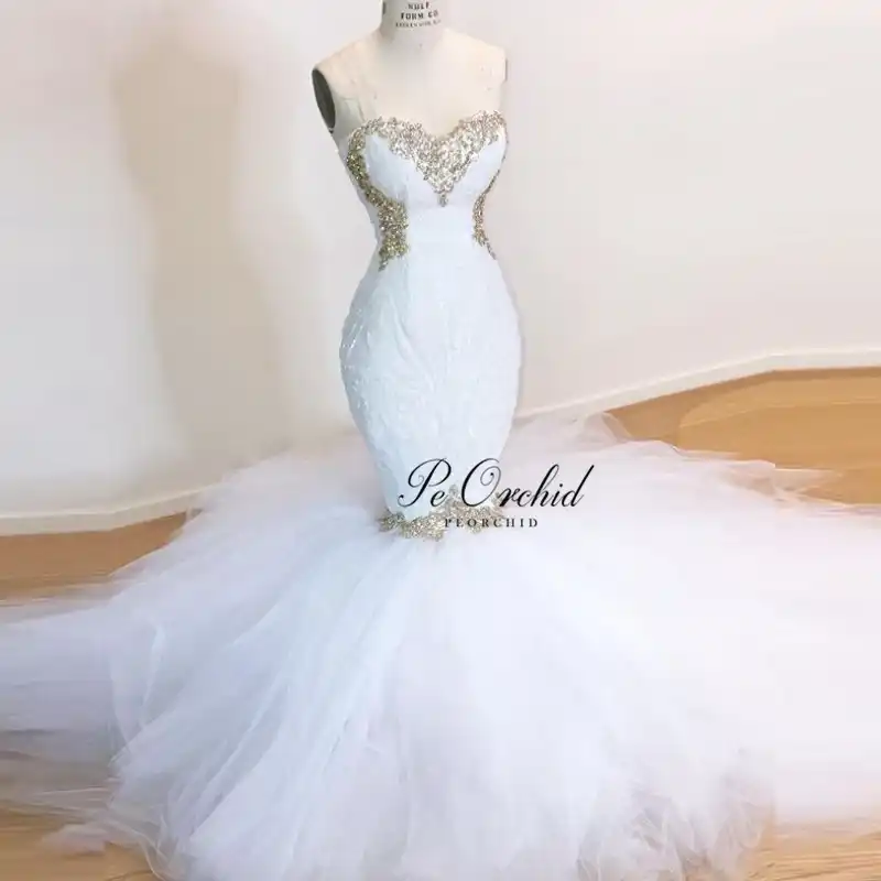 white and gold mermaid wedding dress