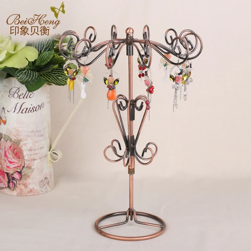 

Creative Rotating Jewelry Display Rack Necklace Earring Pendant Bracelet Holding Rack Rotating Jewelry Trinket Display Holders