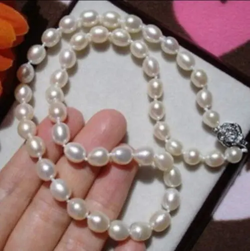 

FREE SHIPPING *******7-8MM WHITE FRESHWATER RICE PEARL NECKLACE 17" LL006
