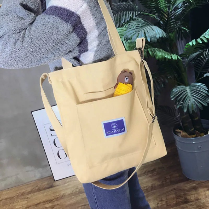 

Envelope canvas bag female literature and art small fresh school wind shopping bag 2019 Korean version contracted single shoulde