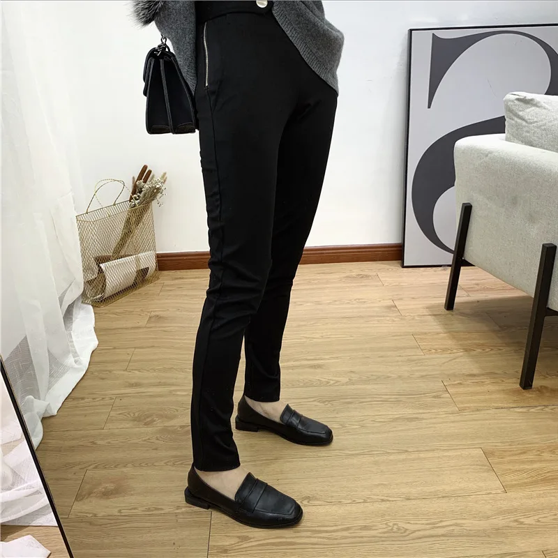 

2018 autumn and winter new women's high quality solid color side zipper black slim trousers