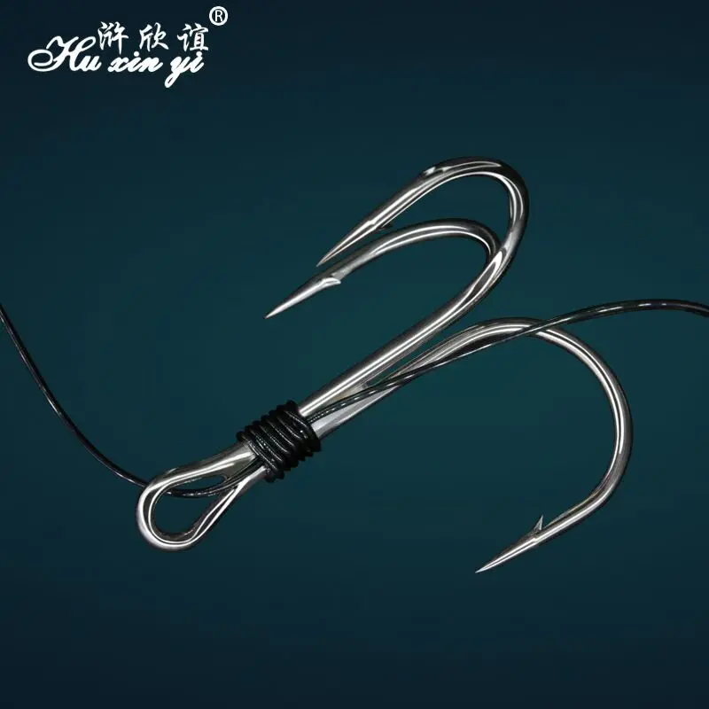 

HXY 1PCS stainless steel Fishing tackle string fishhook with 3 or 4 groups of barbed hooks (large one is 3)( middle one is 4)