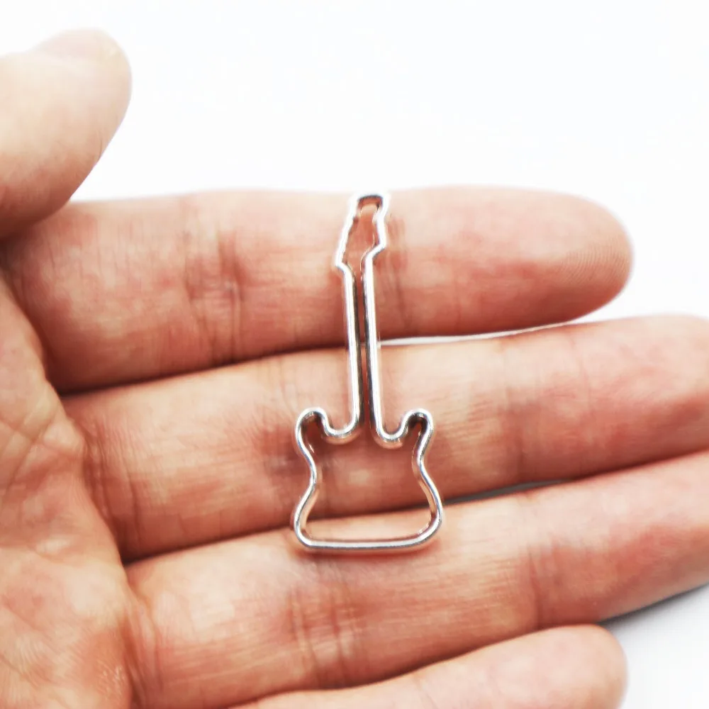 

Hot sell 10pcs metal antique silver charms hollow guitar charms pendant for necklace jewelry findings