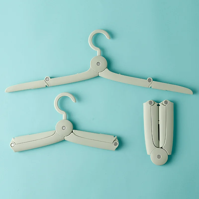 

5Pc Portable Travel Folding Hanger Mini Multifunction Magic Telescopic Clothes Plastic Hangers Simple Practical Cloth Organizer