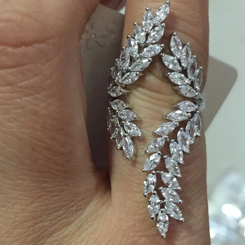 

clear white stone with white gold-color micro pave setting angel wings wedding ring for women