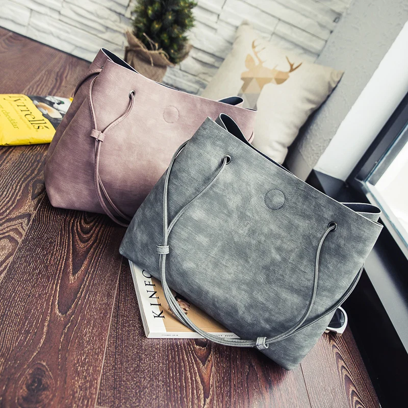 

New European and American retro women's handbags Korean fashion suit large bucket bag shoulder slung travel portable bag