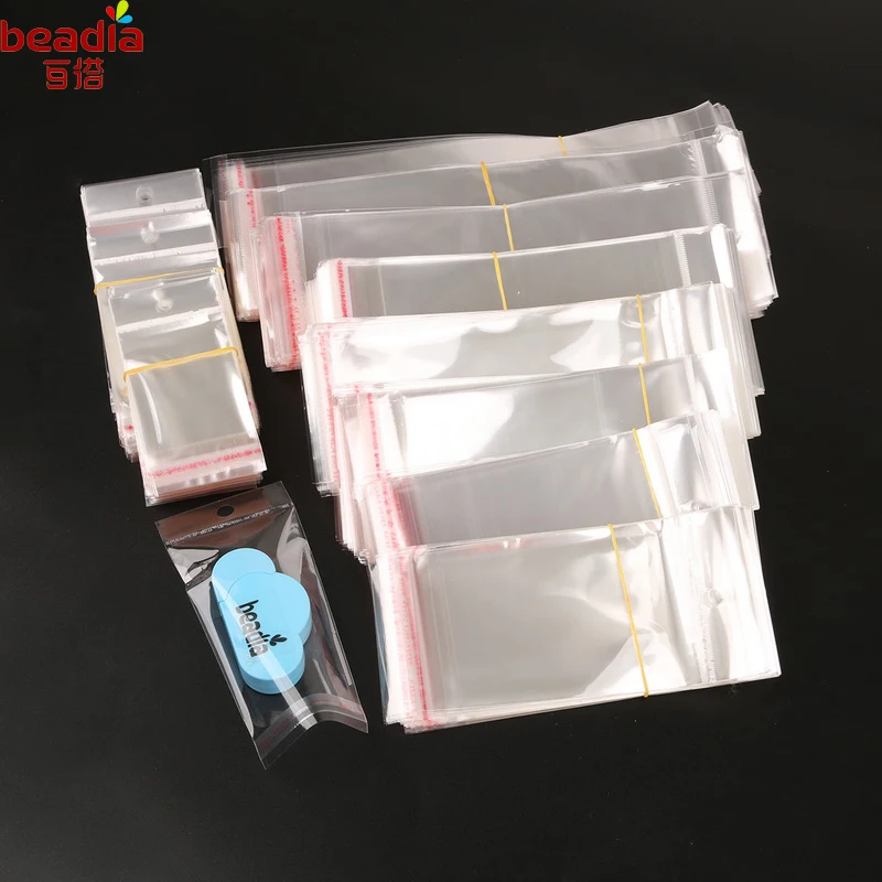 

Transparent Clear Self-Adhesive Plastic Storage Bag with Header For Jewelry Packaging,Gift Bag Size 8x15.5cm/8x20cm/7x24cm