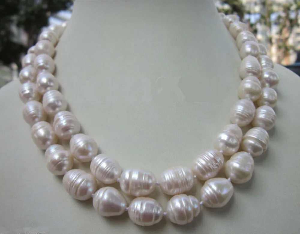 

Free Shipping >>Huge 10-12MM WHITE FRESHWATER Cultured BAROQUE PEARL NECKLACE 33 INCH