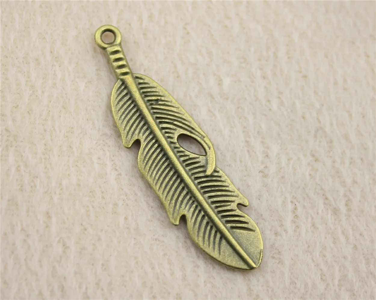 

32pcs/lot 49*13mm ancient bronze Feather charm Pendants DIY jewelry for bracelet necklace earring