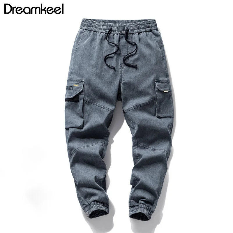 

2019 autumn new jeans Korean version of the self-cultivation tide brand personality casual youth students feet men's pants Y