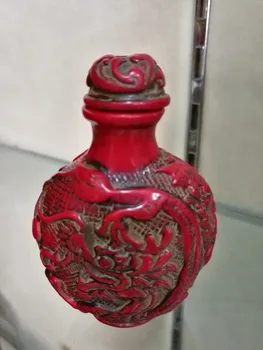 

Antique red coral carved dragon and phoenix snuff bottles