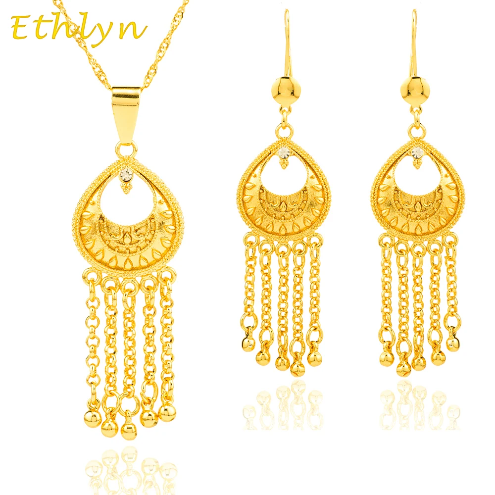 

Ethlyn African Nigerian Ethiopian Gold Color Dangle Eaarrings Pendant Necklace Jewelry sets