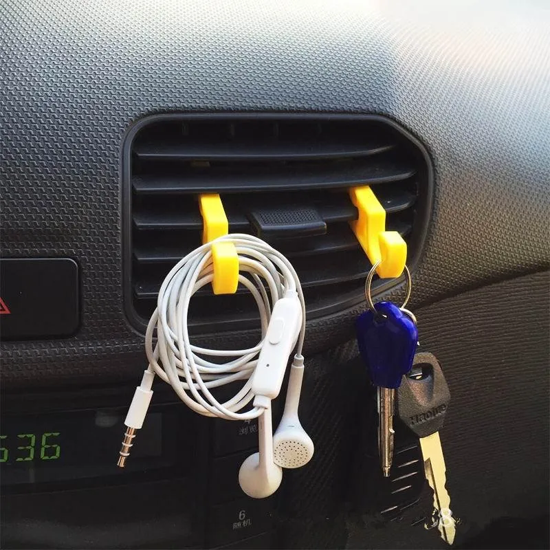 

2pcs New Car Air Conditioning Clip Glasses Key Earphone Hook Portable Phone Stand Interior Stowing Tidying Storage New Arrival