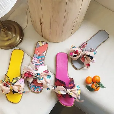 

Coloured ribbon bow flat-heeled slippers