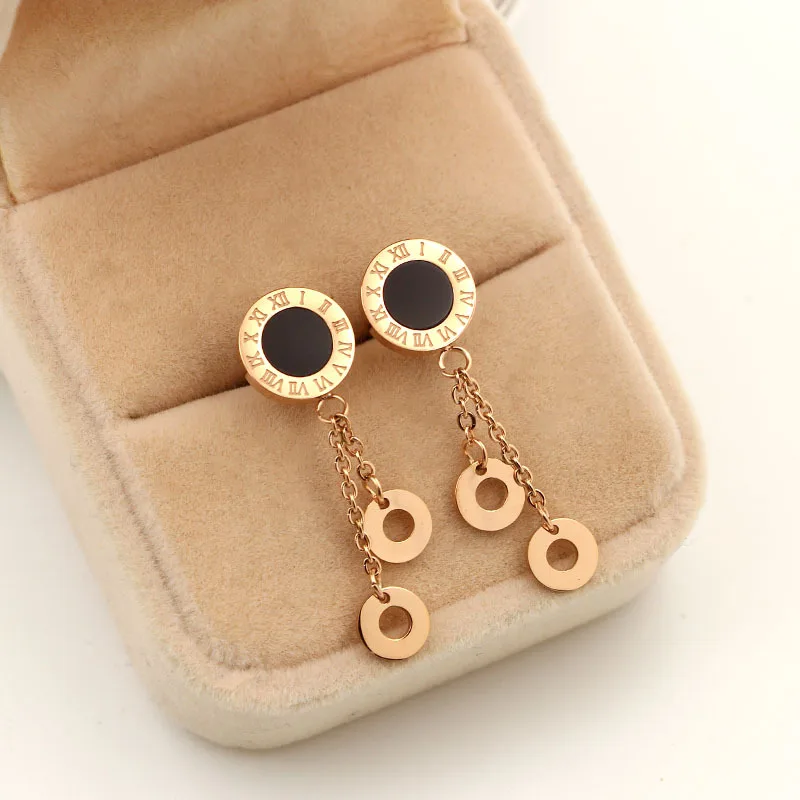 

Fashion influx of people titanium steel anti-allergic tassel earrings Roman digital shell black and white hanging double circle