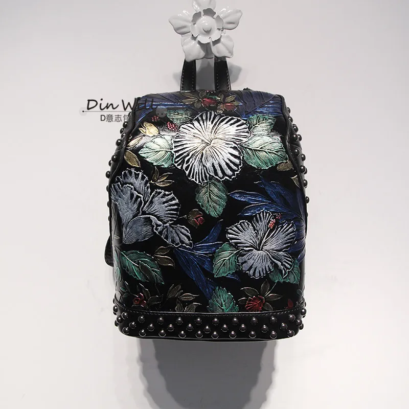 

Ethnic Wind Dazzle Color Embossed Double-shoulder Female Bag Exquisite Rivet Leather Large Capacity Genuine Leather Backpack