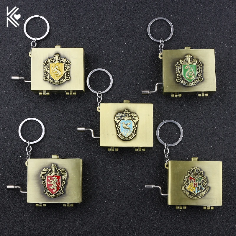 

Hogwarts Magic Academy Music Box Keychain Gryffindor Slytherin Hufflepuff Ravenclaw Brand Gift Box Key Chain Gifts For Men Women