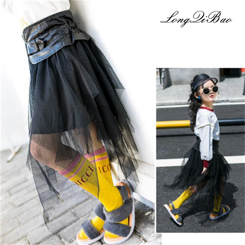 

Baby girl Korean version of the leather skirt autumn children's clothing 2018 new girl irregular mesh skirt fashion skirt